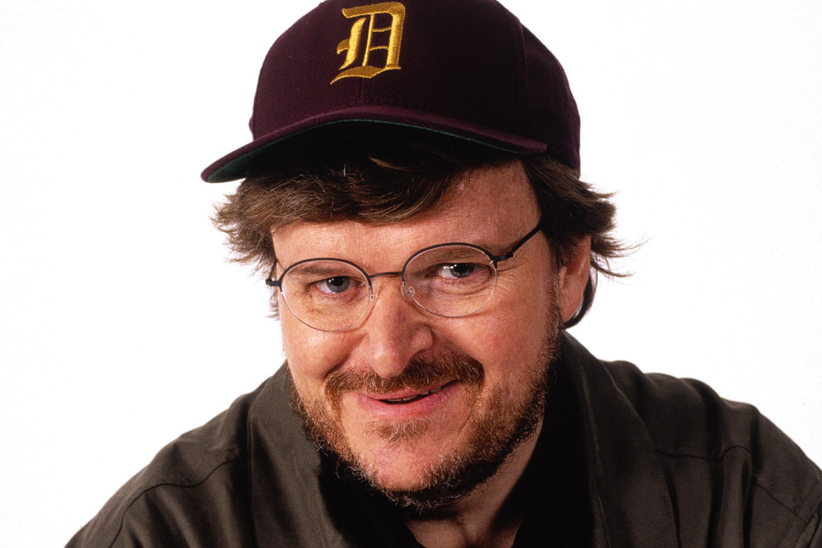 Michael Moore vai além da perseguição a Bush em seu novo documentário. mecanoblog.files.wordpress.com